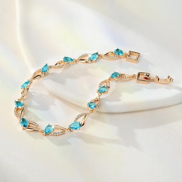 Neiman Marcus 18K Gold Plated Navy Blue Twist Trinity Eternity Tennis Bracelet - Picture 3 of 4